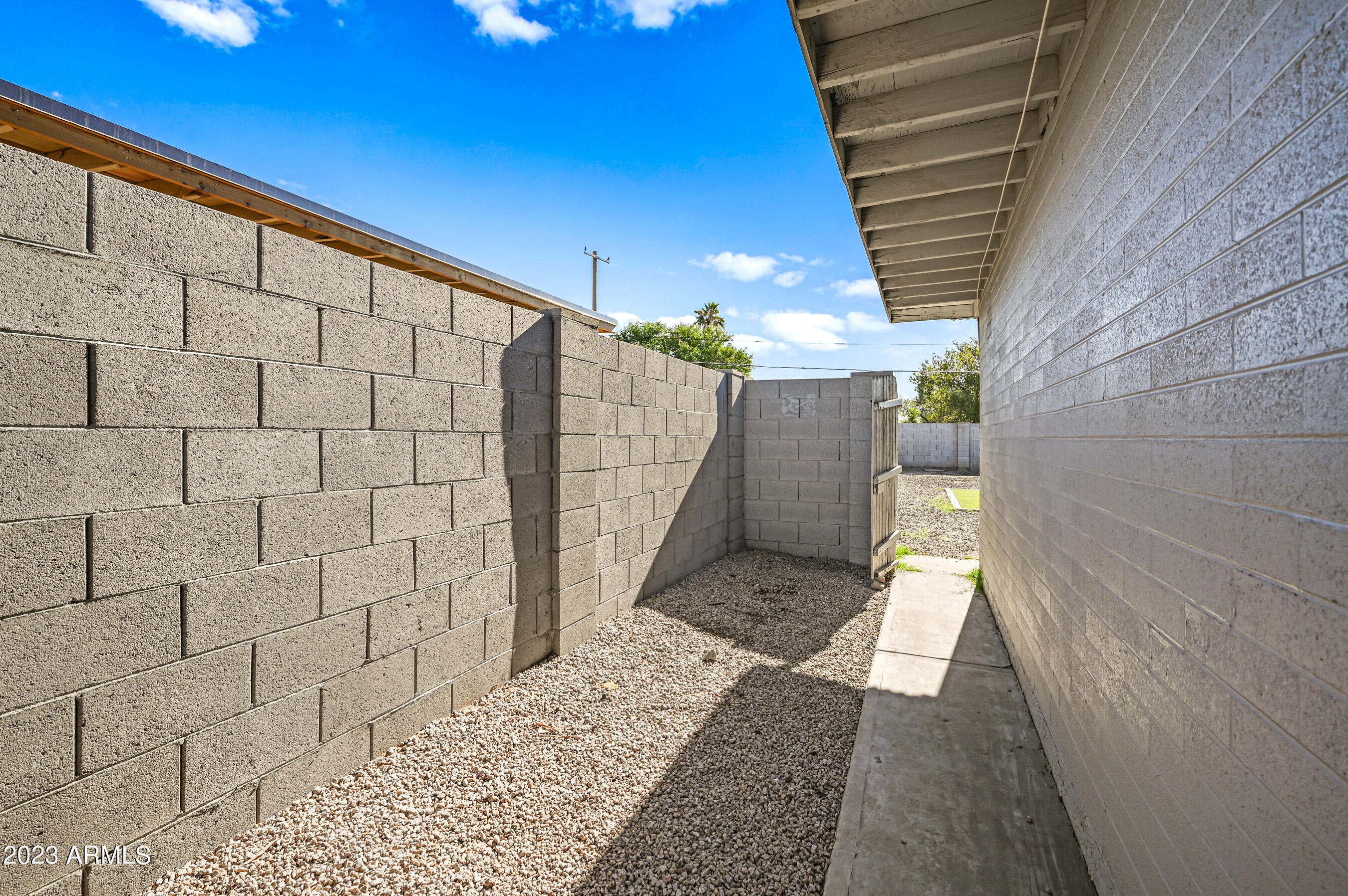 1145 East Henry Street Tempe, AZ 85288 - Photo 14 of 15 a view of a pathway of a building