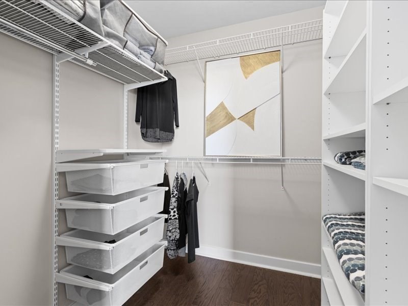 1245 Adams Street, Unit B210 Boston, MA 02124 - Photo 21 of 39 a view of walk in closet with empty racks