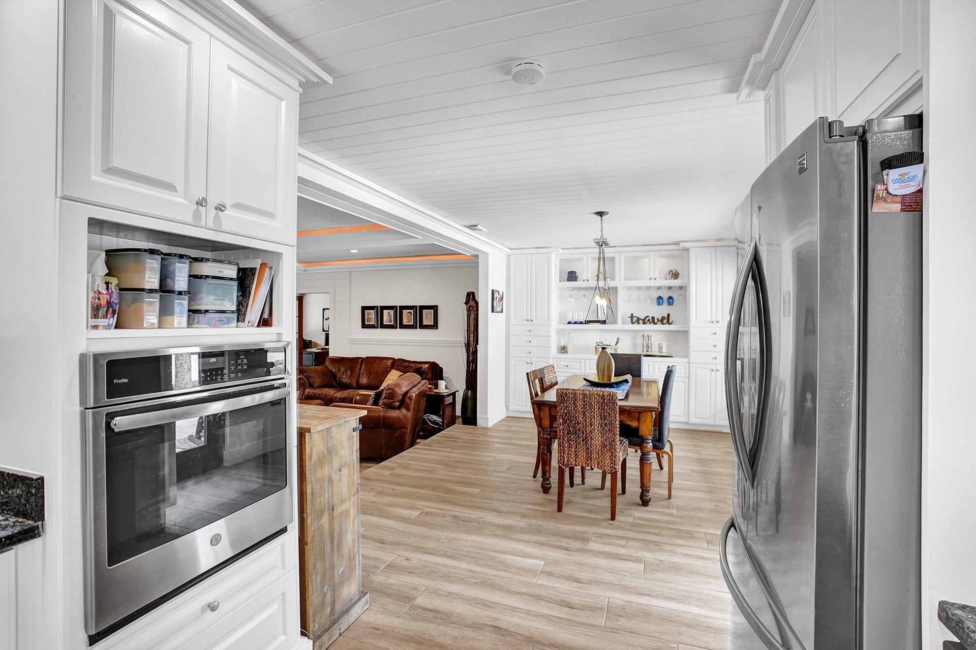 5612 Harding Street Hollywood, FL 33021 - Photo 15 of 59 a view of a kitchen and dining room