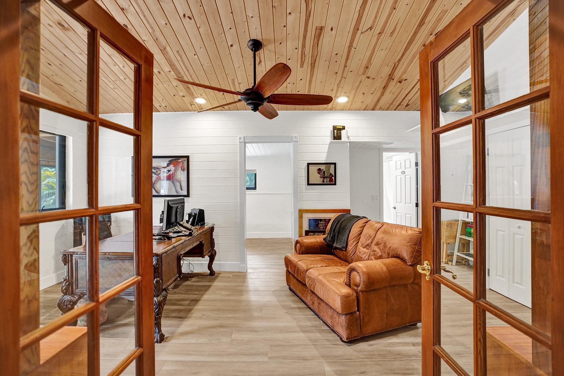 5612 Harding Street Hollywood, FL 33021 - Photo 21 of 59 a living room with furniture and a large window