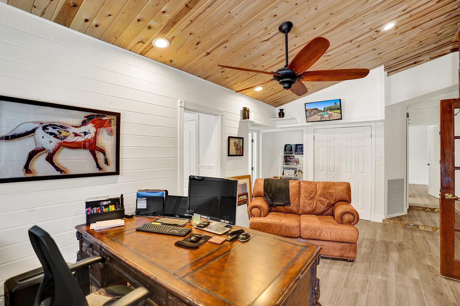 5612 Harding Street Hollywood, FL 33021 - Photo 22 of 59 a living room with furniture and wooden floor