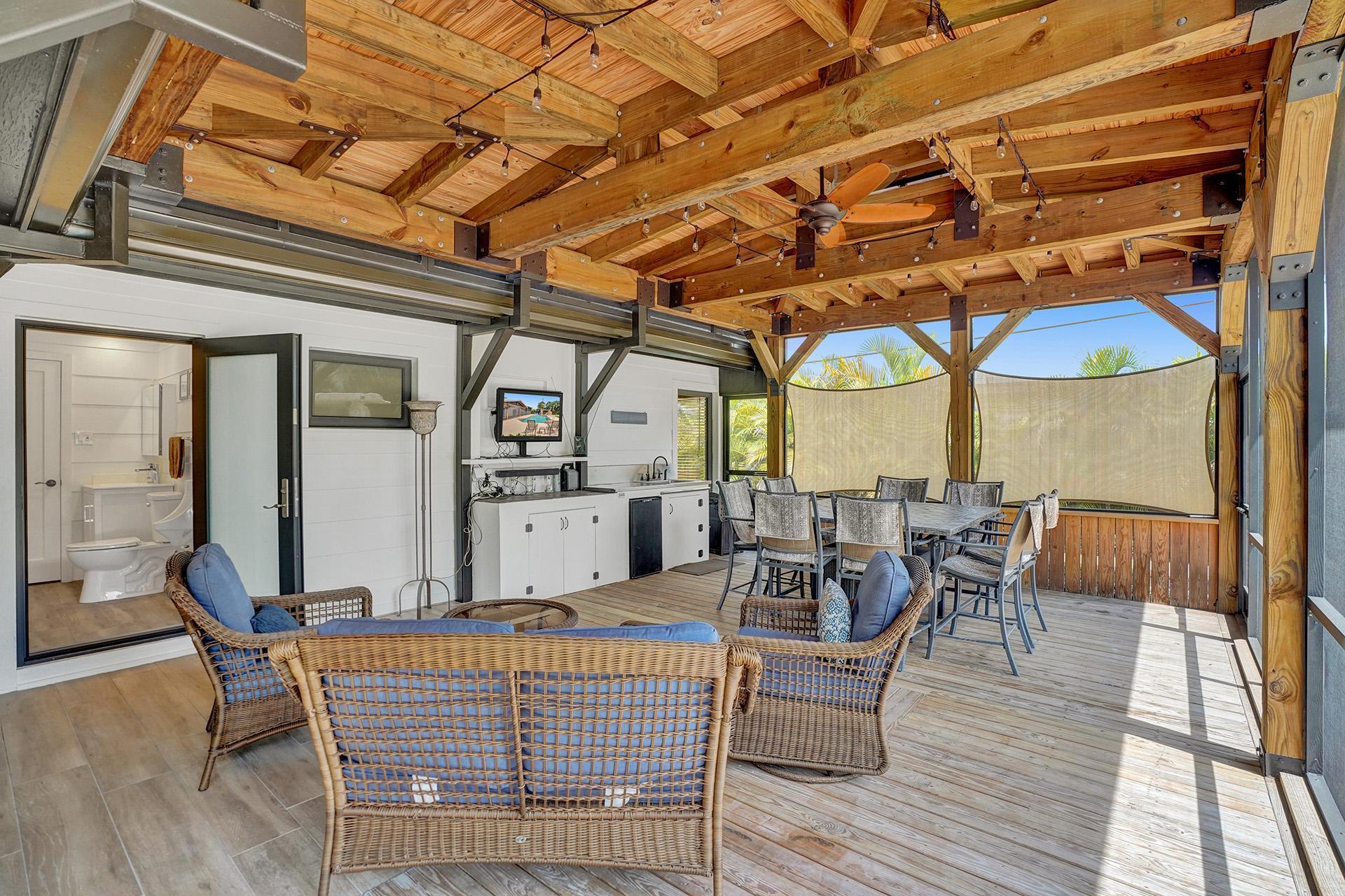 5612 Harding Street Hollywood, FL 33021 - Photo 34 of 59 a view of a dining room with furniture window and outside view