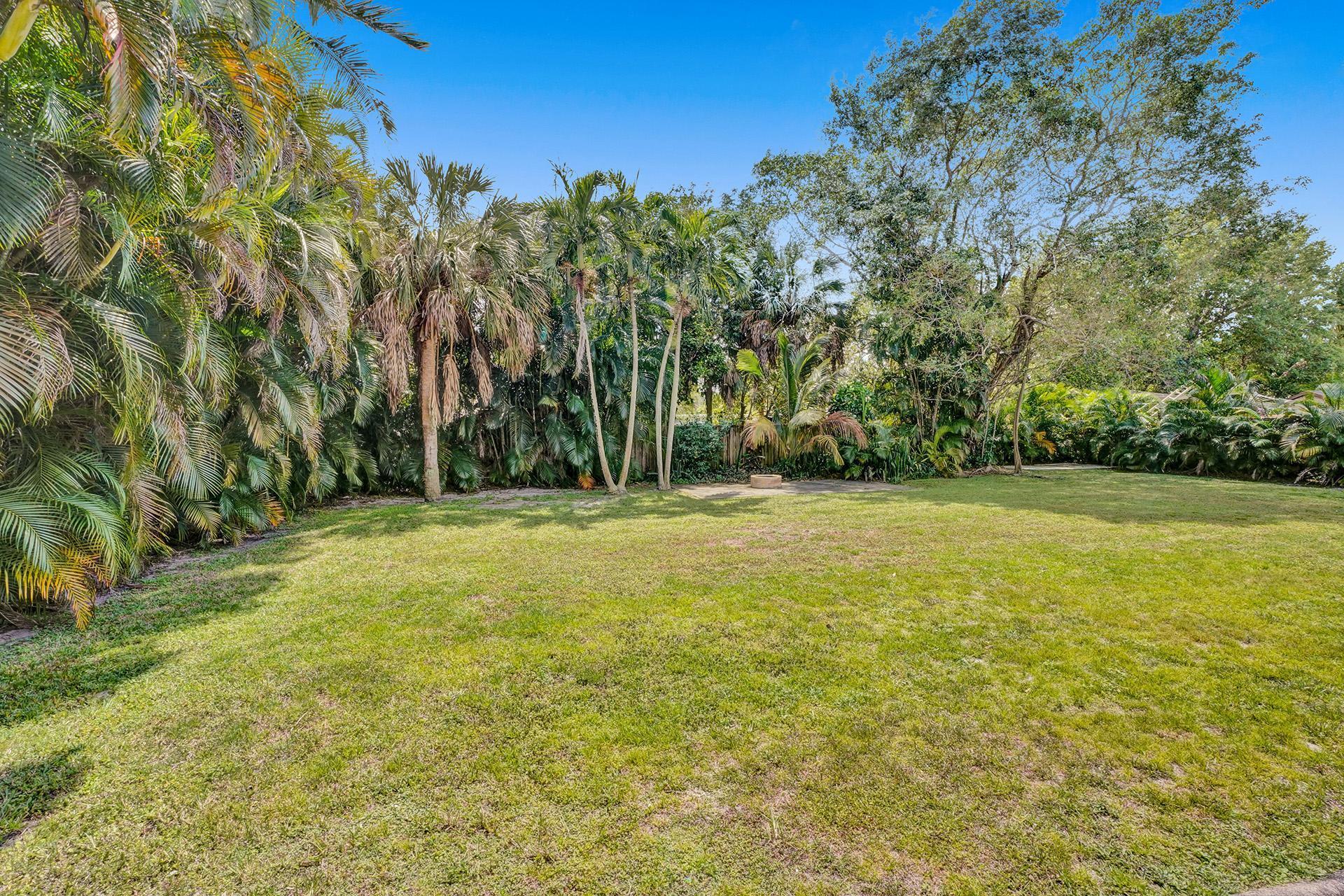 5612 Harding Street Hollywood, FL 33021 - Photo 42 of 59 a view of a yard with a trees