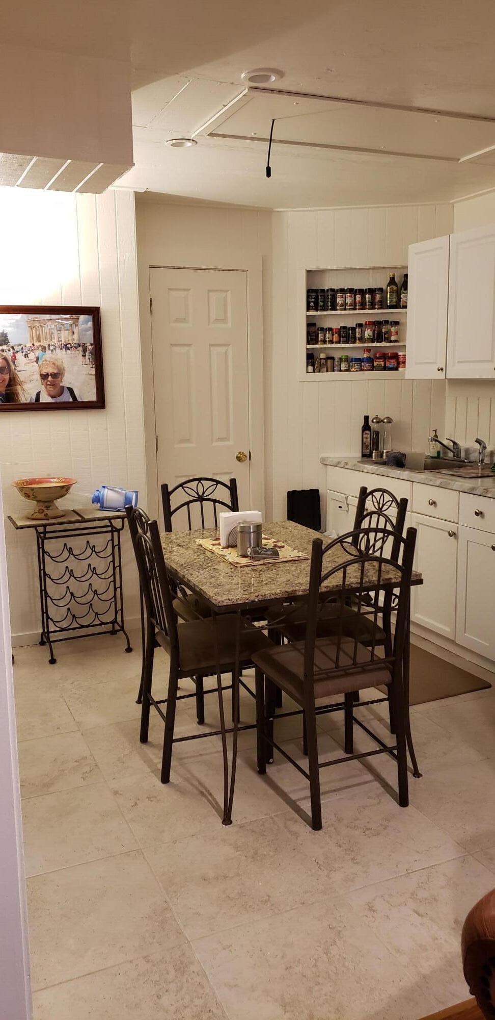 5612 Harding Street Hollywood, FL 33021 - Photo 54 of 59 a view of a dining room with furniture