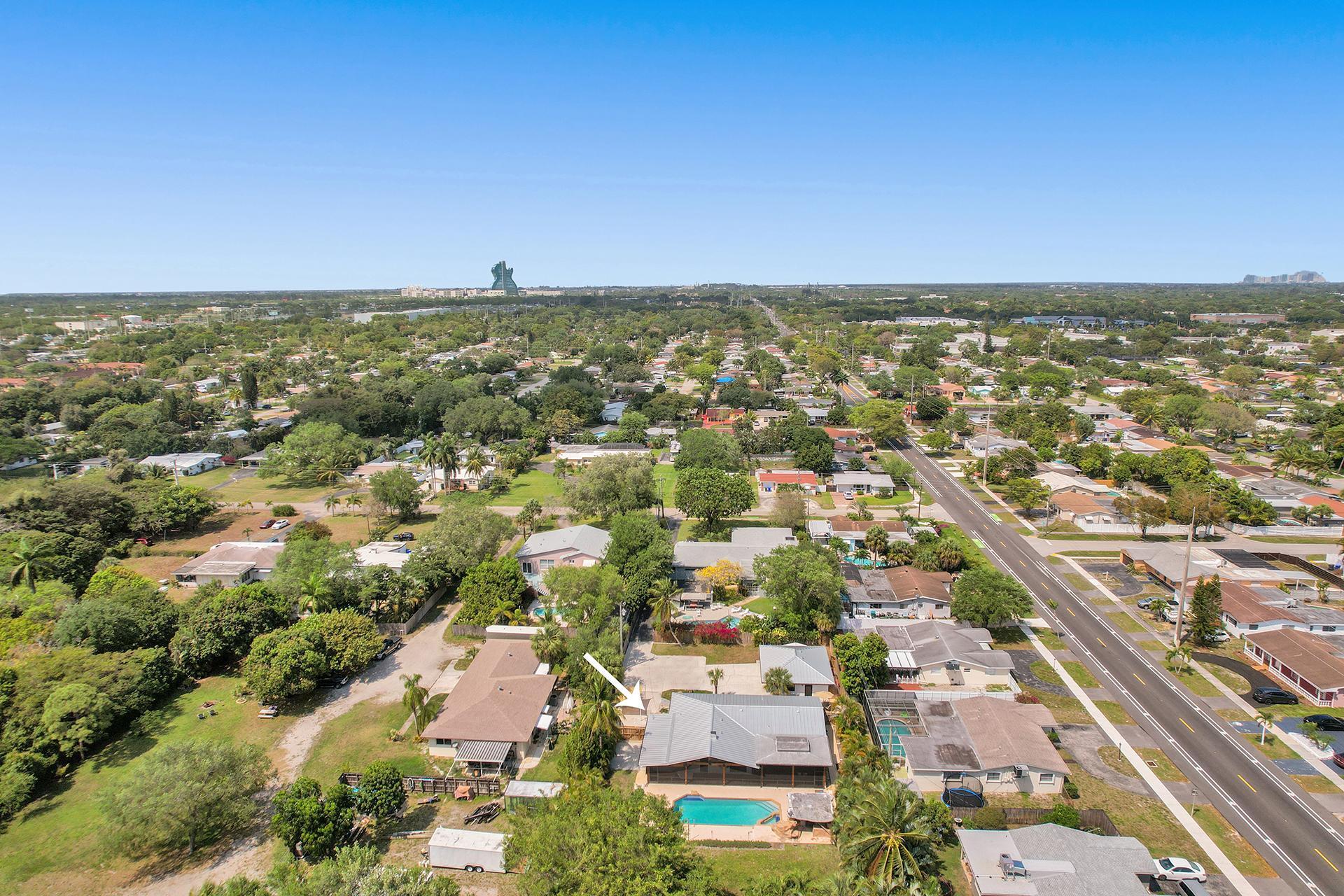 5612 Harding Street Hollywood, FL 33021 - Photo 7 of 59 an aerial view of residential houses with outdoor space