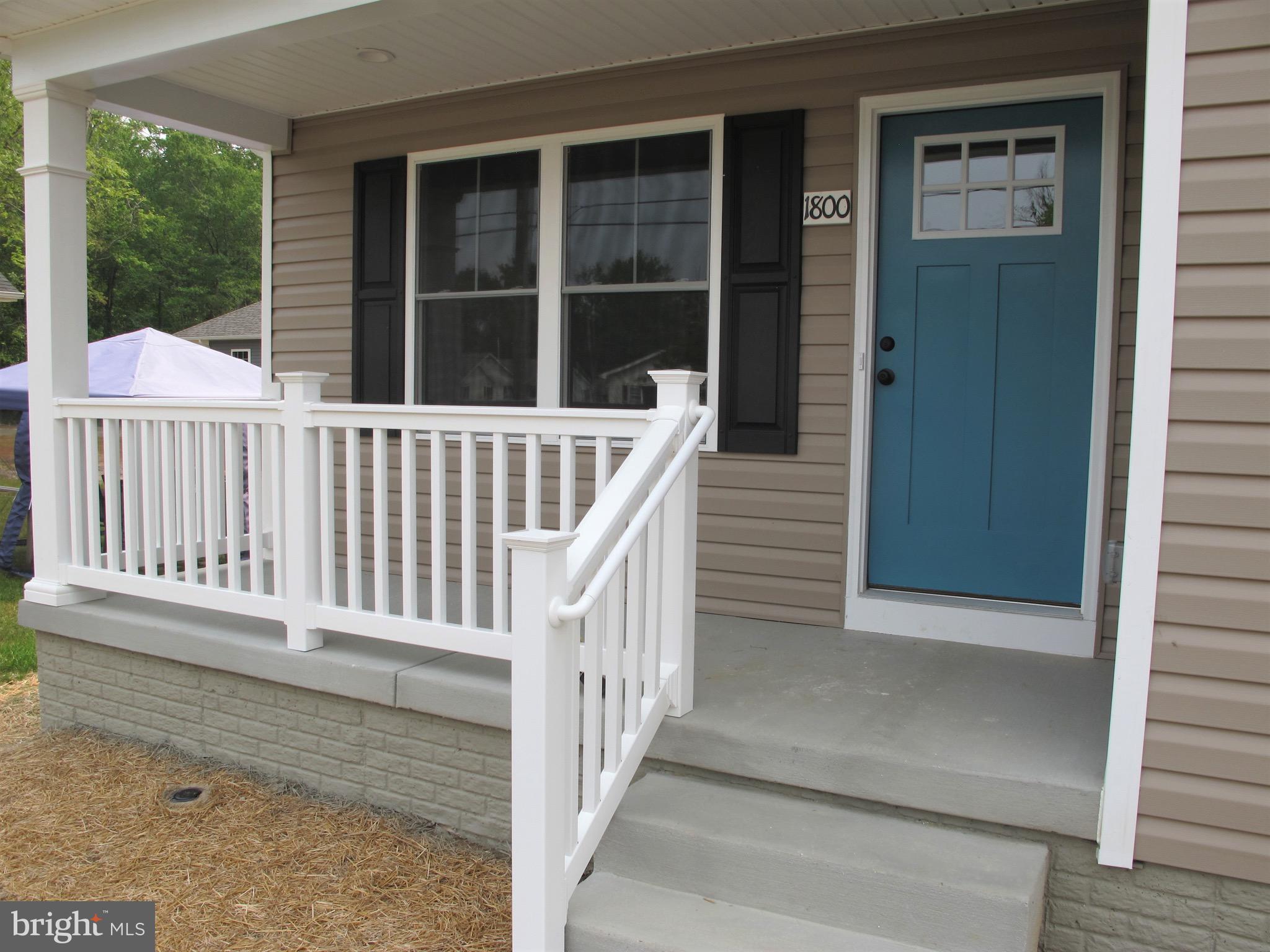145 9th Street Colonial Beach, VA 22443 - Photo 2 of 51 a view of wooden balcony