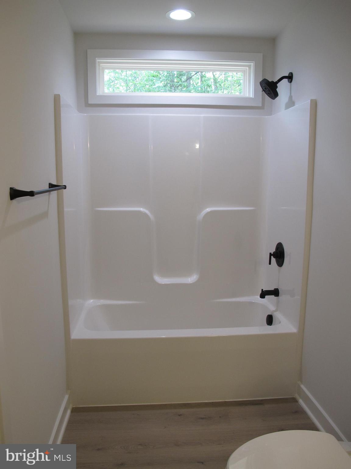 145 9th Street Colonial Beach, VA 22443 - Photo 30 of 51 a bathroom with a bathtub