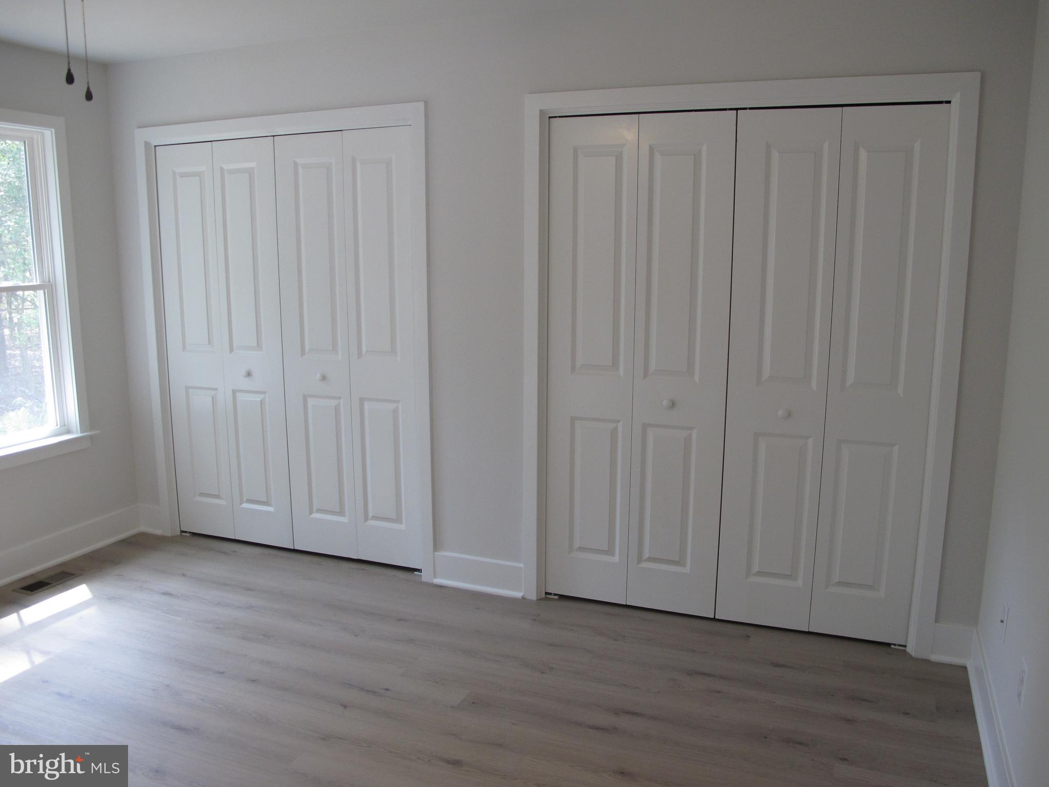 145 9th Street Colonial Beach, VA 22443 - Photo 38 of 51 a view of a livingroom with wooden floor