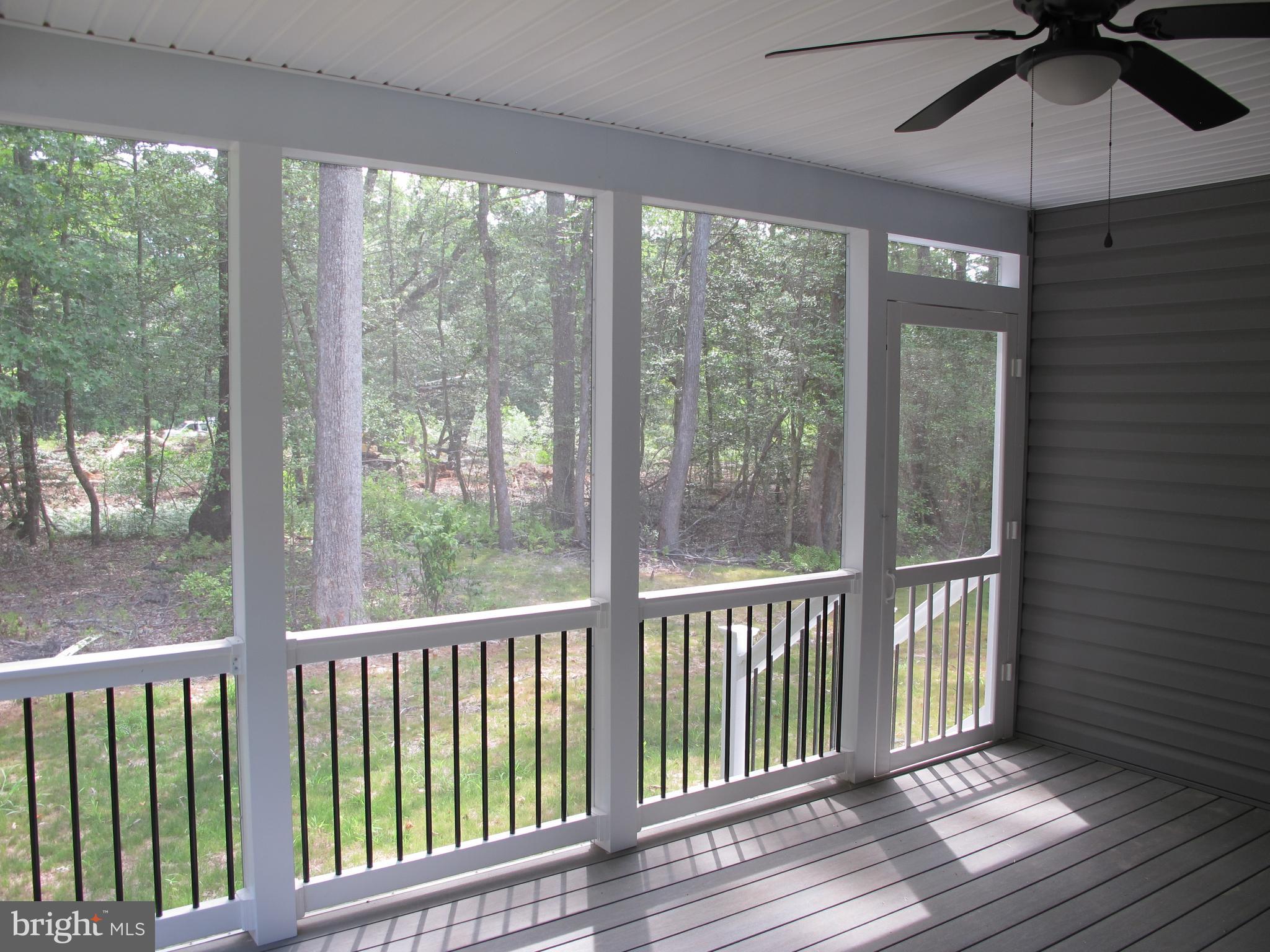 145 9th Street Colonial Beach, VA 22443 - Photo 43 of 51 a view of a balcony with wooden floor