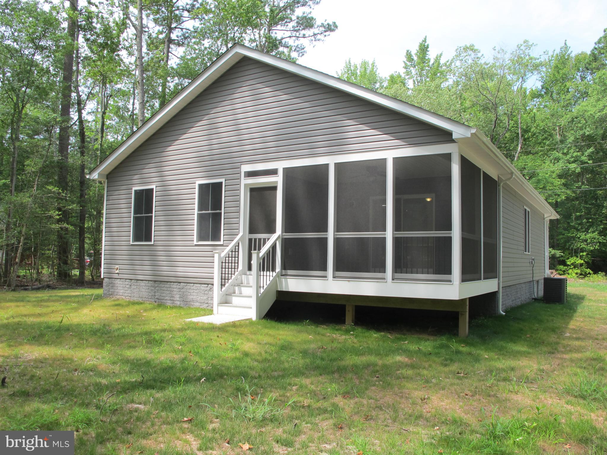 145 9th Street Colonial Beach, VA 22443 - Photo 46 of 51 a view of a house with a yard
