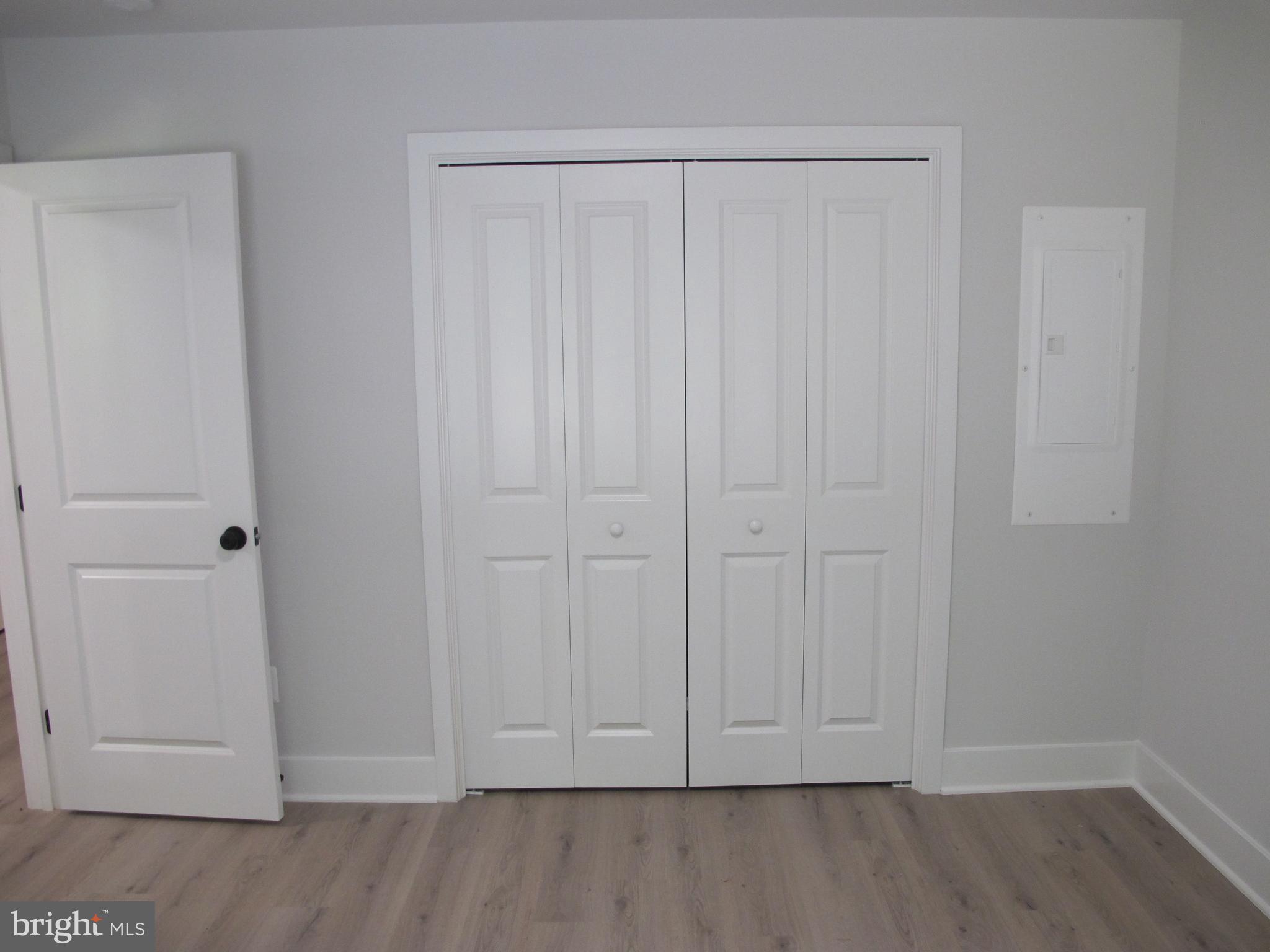 145 9th Street Colonial Beach, VA 22443 - Photo 9 of 51 a view of room with hardwood floor
