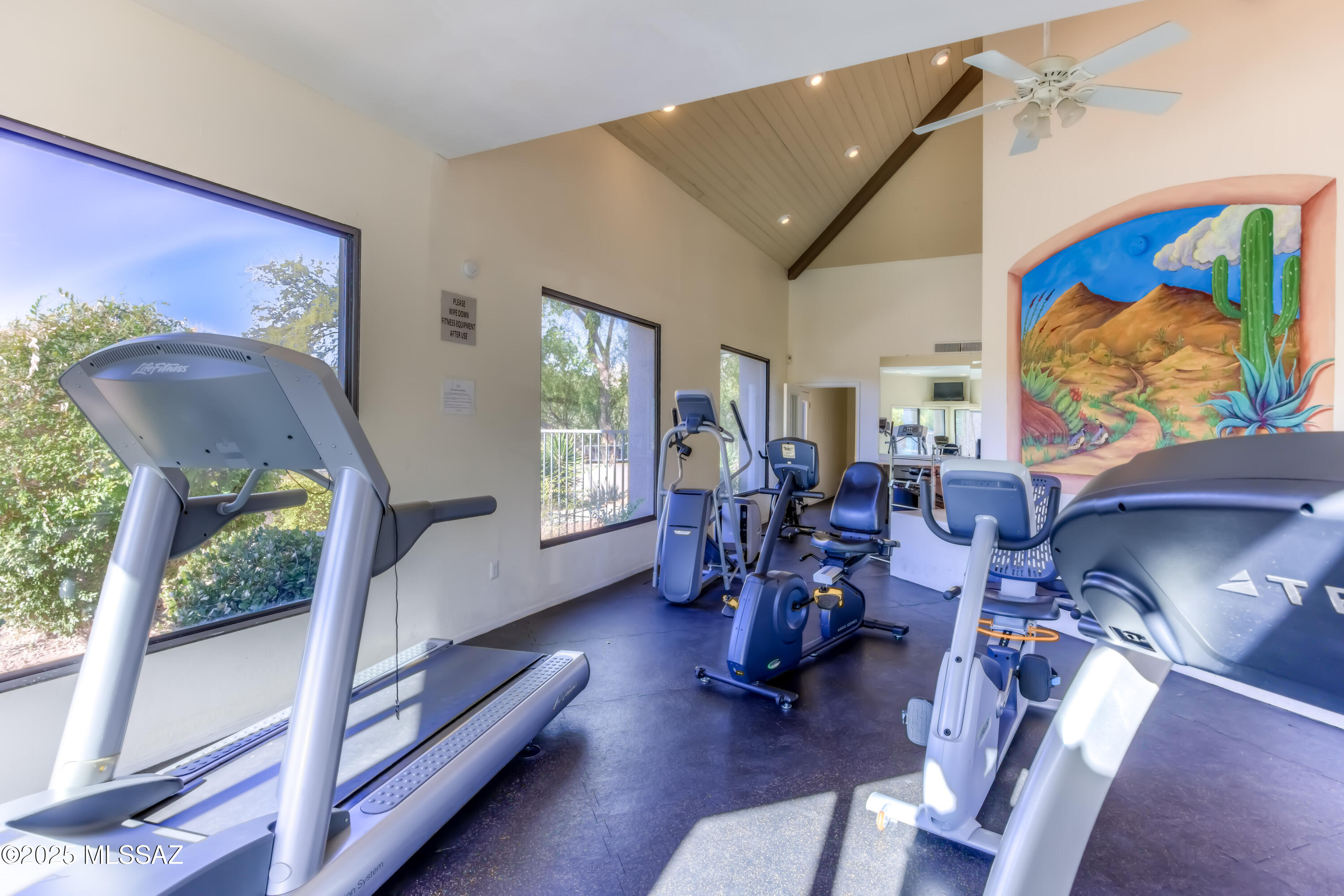 5855 North Kolb Road, Unit 8102 Tucson, AZ 85750 - Photo 20 of 28 a living room with furniture and a large window