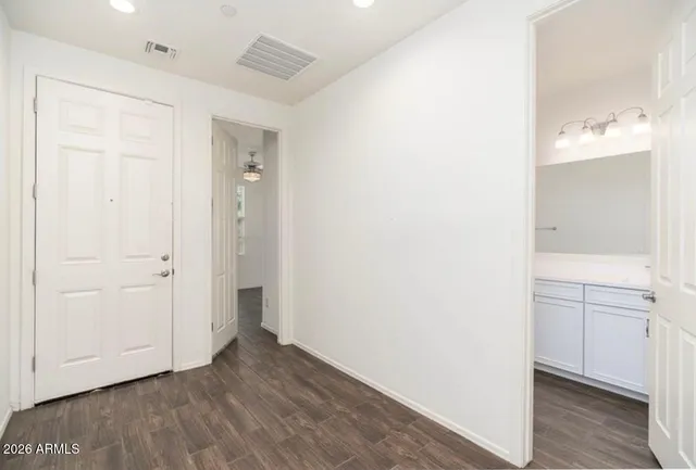 a view of a storage & utility room with closet