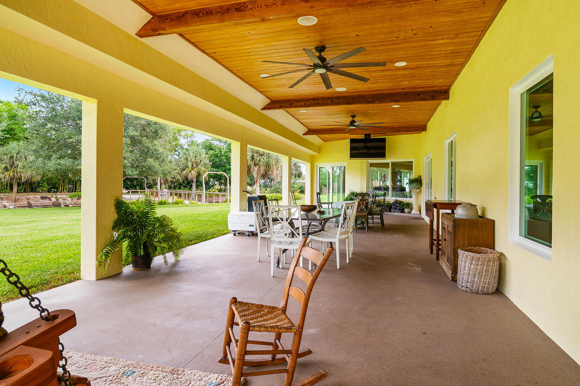6624 Dillman Road Greenacres, FL 33413 - Photo 50 of 77 Lanai with drop down TV
