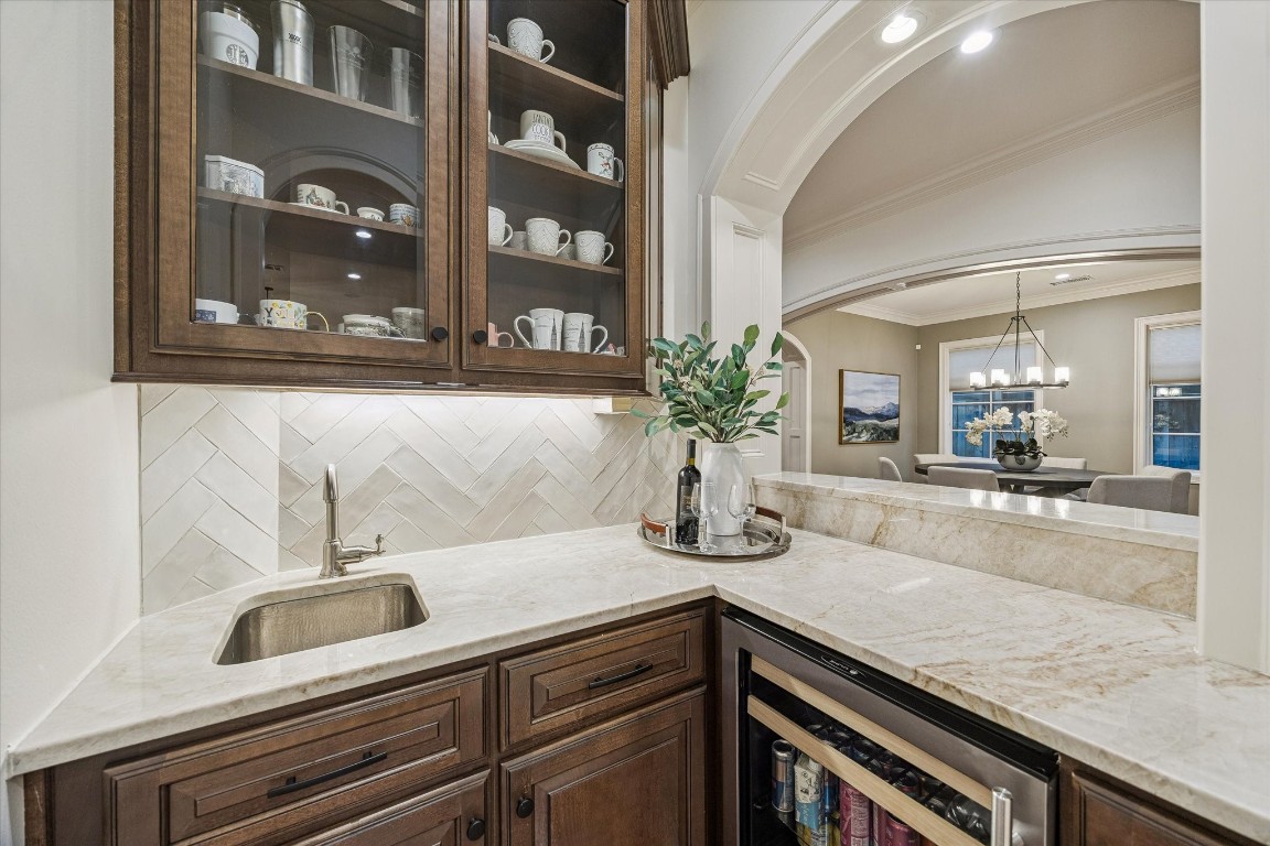 3810 Drake Street Houston, TX 77005 - Photo 17 of 48 WET BAR. Discreetly located off the kitchen, the wet bar was designed to look like its part of the main kitchen yet it can serve as it's own separate space, ideal for entertaining.