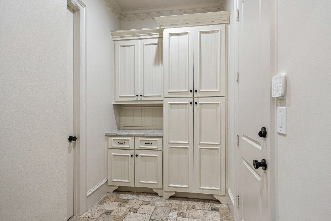 3810 Drake Street Houston, TX 77005 - Photo 19 of 48 a view of cabinets and utility room