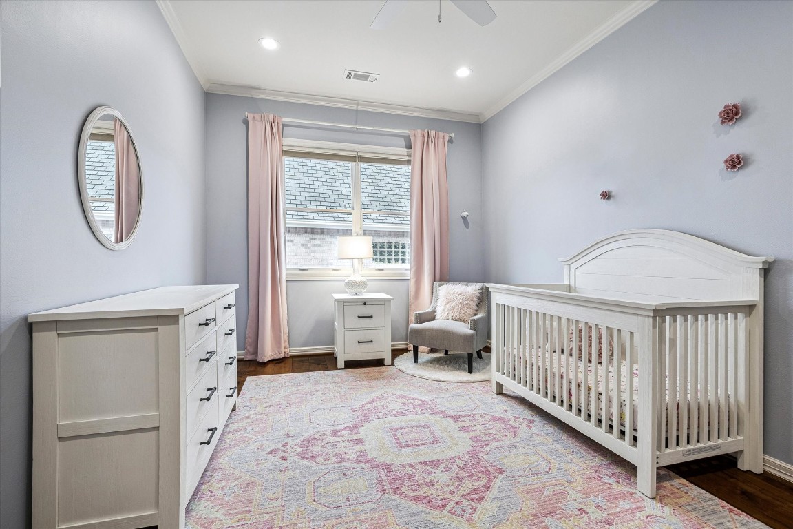 3810 Drake Street Houston, TX 77005 - Photo 28 of 48 a spacious bedroom with a bed and a window