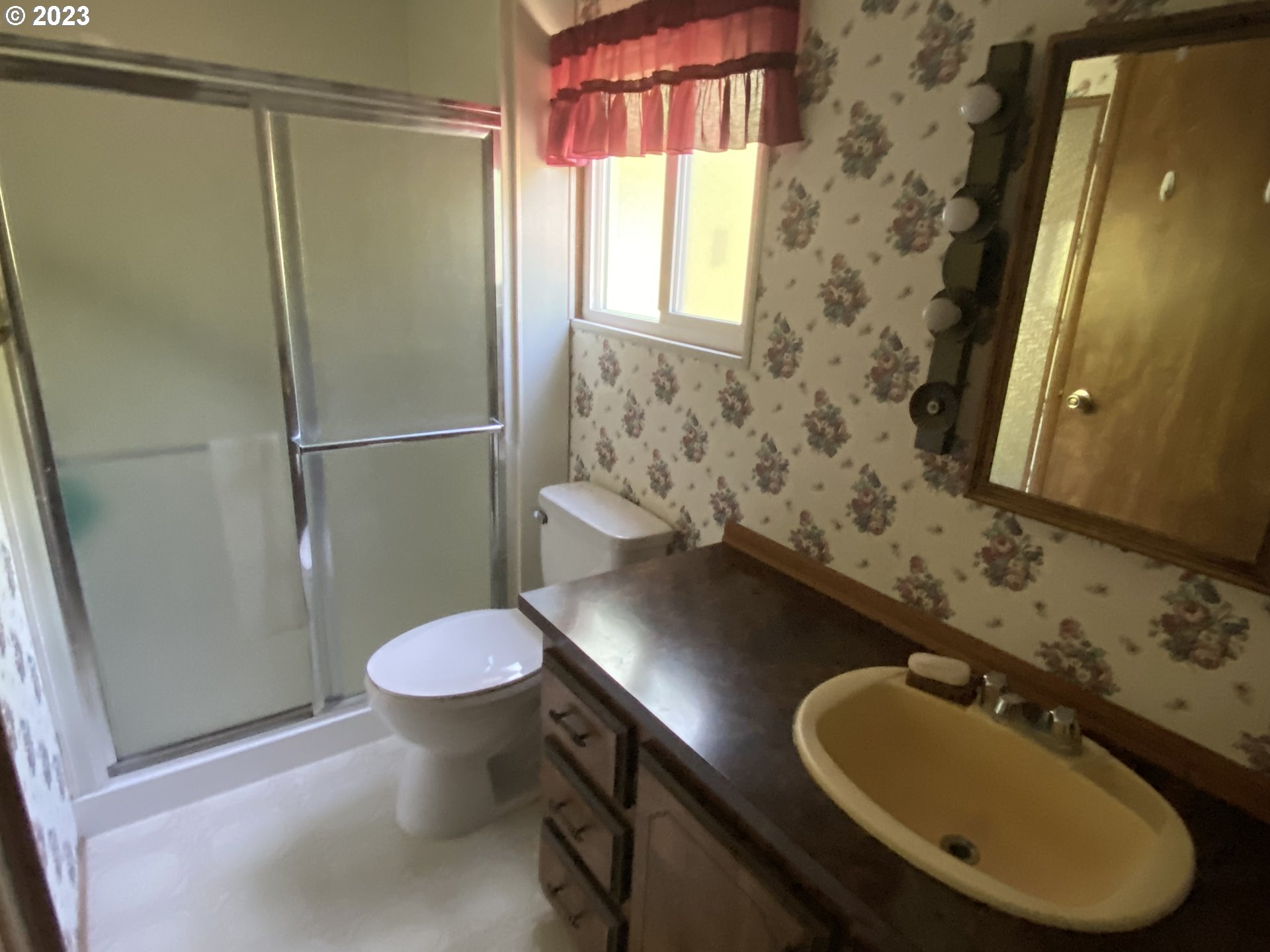 1400 Candlelight Drive, Unit 160 Eugene, OR 97402 - Photo 14 of 31 a bathroom with a sink toilet and shower