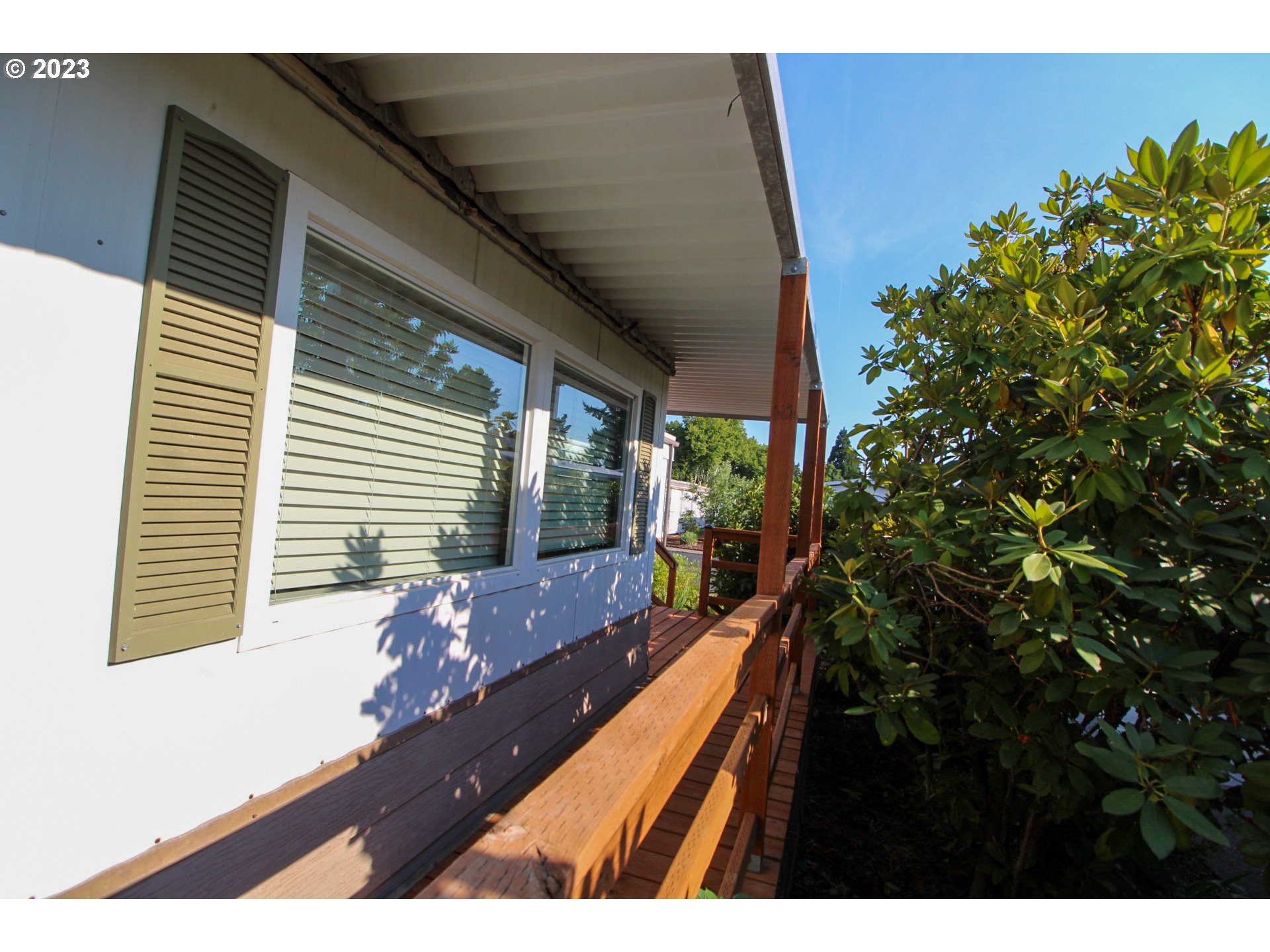 1400 Candlelight Drive, Unit 160 Eugene, OR 97402 - Photo 21 of 31 a view of balcony with wooden floor and outdoor space
