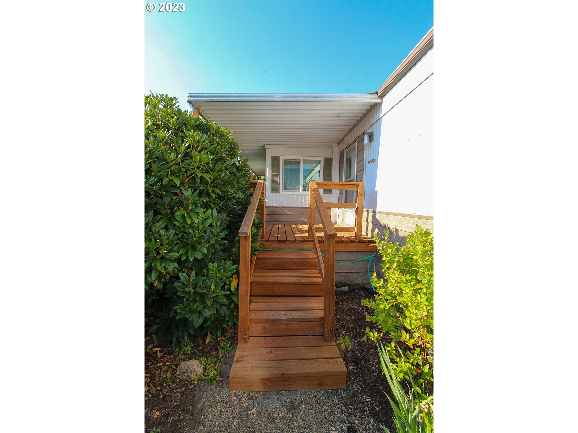1400 Candlelight Drive, Unit 160 Eugene, OR 97402 - Photo 22 of 31 a view of a pathway of the house with a yard