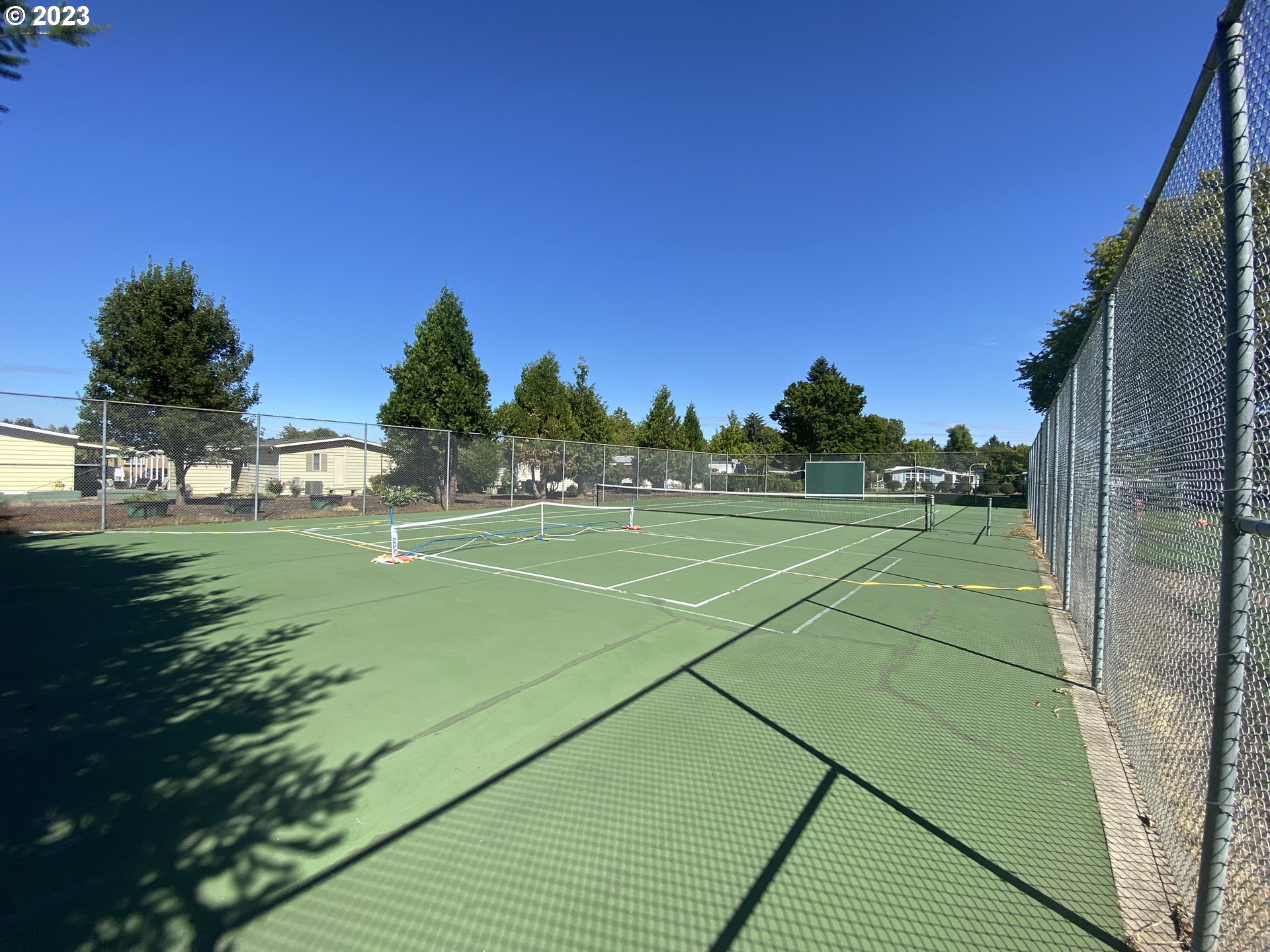 1400 Candlelight Drive, Unit 160 Eugene, OR 97402 - Photo 29 of 31 a view of an outdoor space and tennis court