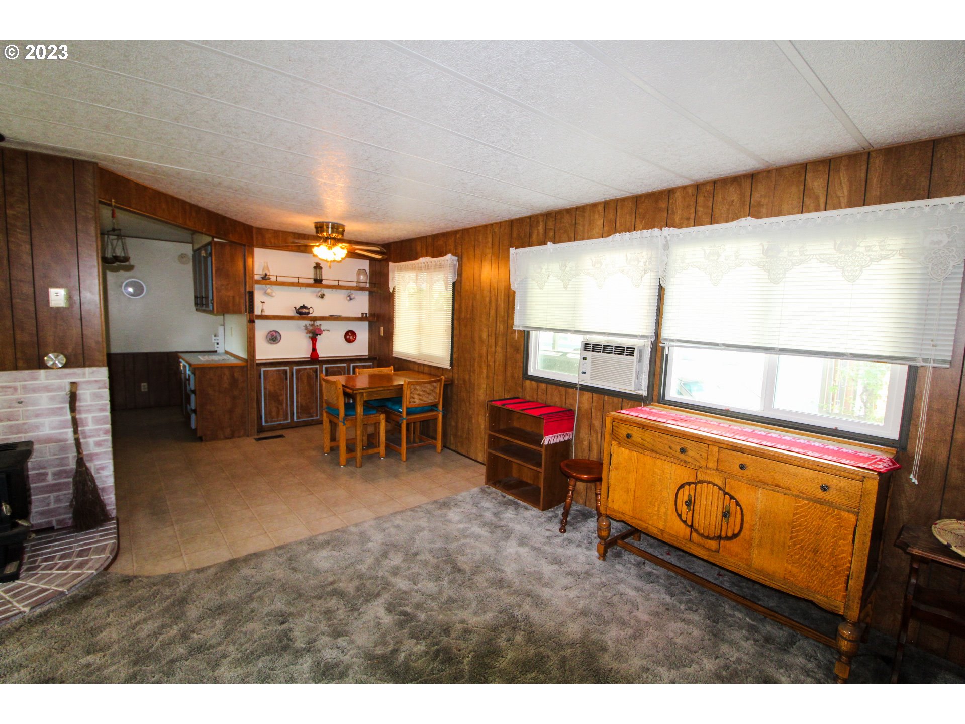 1400 Candlelight Drive, Unit 160 Eugene, OR 97402 - Photo 8 of 31 a view of a chairs and table in a room