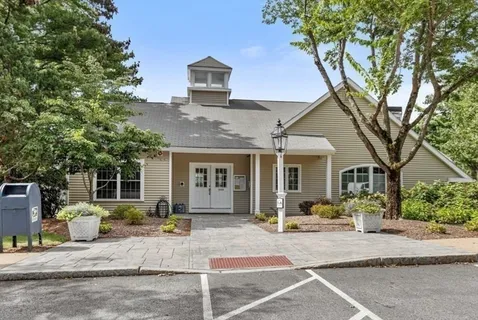a front view of a house with a outdoor space