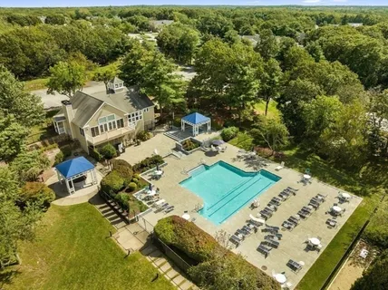 a view of a table and chairs in the patio