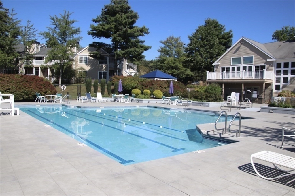 354 Tilden Commons Lane, Unit 354 Braintree, MA 02184 - Photo 25 of 35 a view of a house with entertaining space