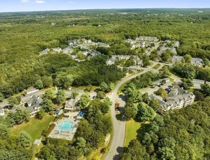 a view of a field with an ocean