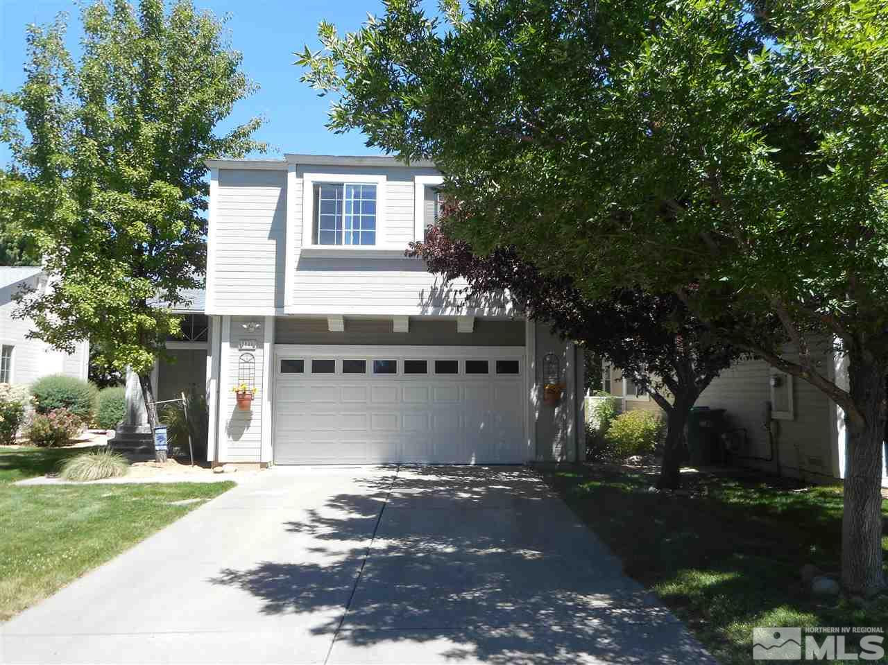 7548 Whimbleton Way Reno, NV 89511 - Photo 1 of 1 a front view of house with yard