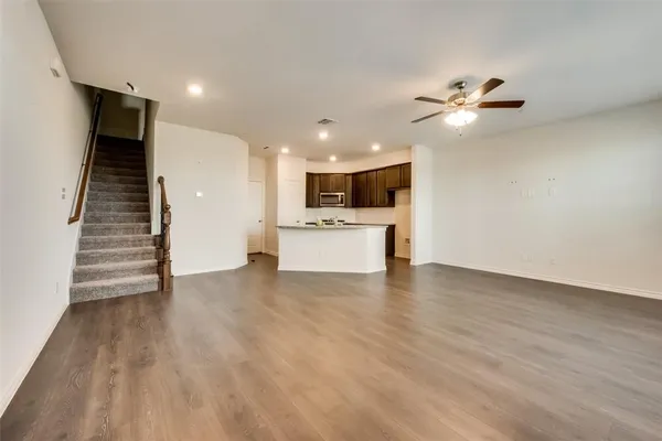 a view of a kitchen with a sink and dishwasher