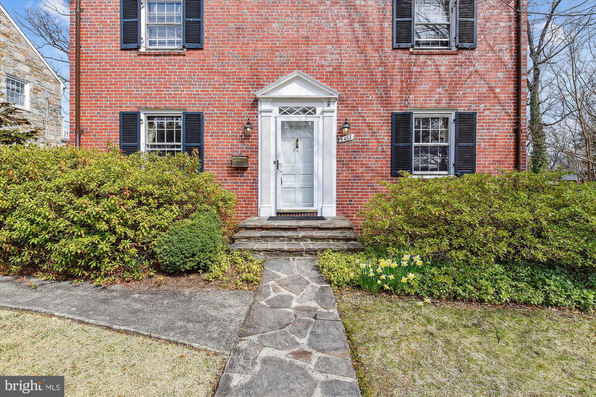 5433 Springlake Way Baltimore, MD 21212 - Photo 2 of 58 front view of a brick house with a small yard