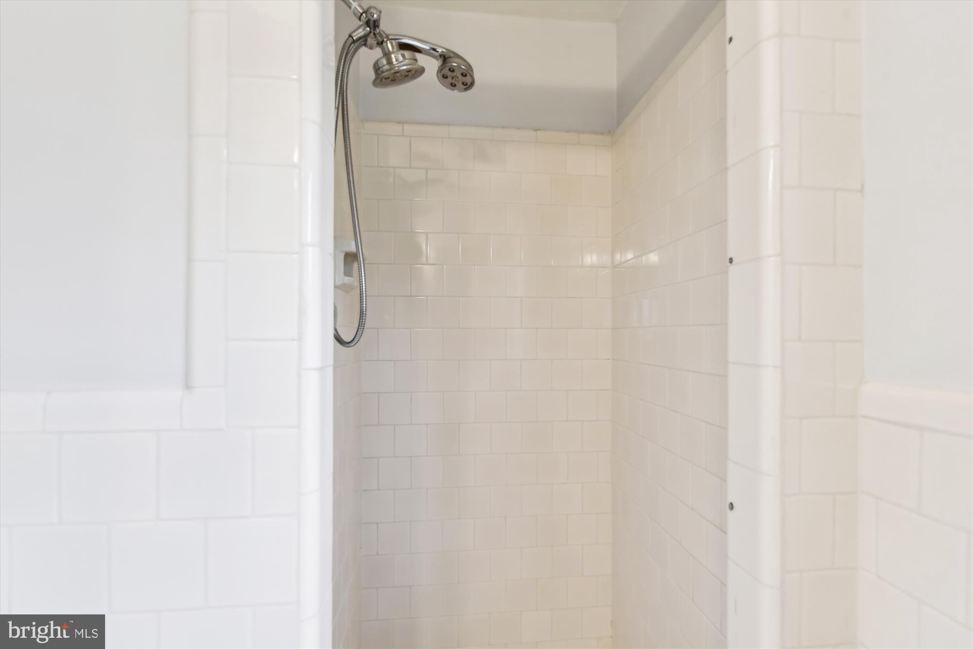 5433 Springlake Way Baltimore, MD 21212 - Photo 28 of 58 a bathroom with a shower