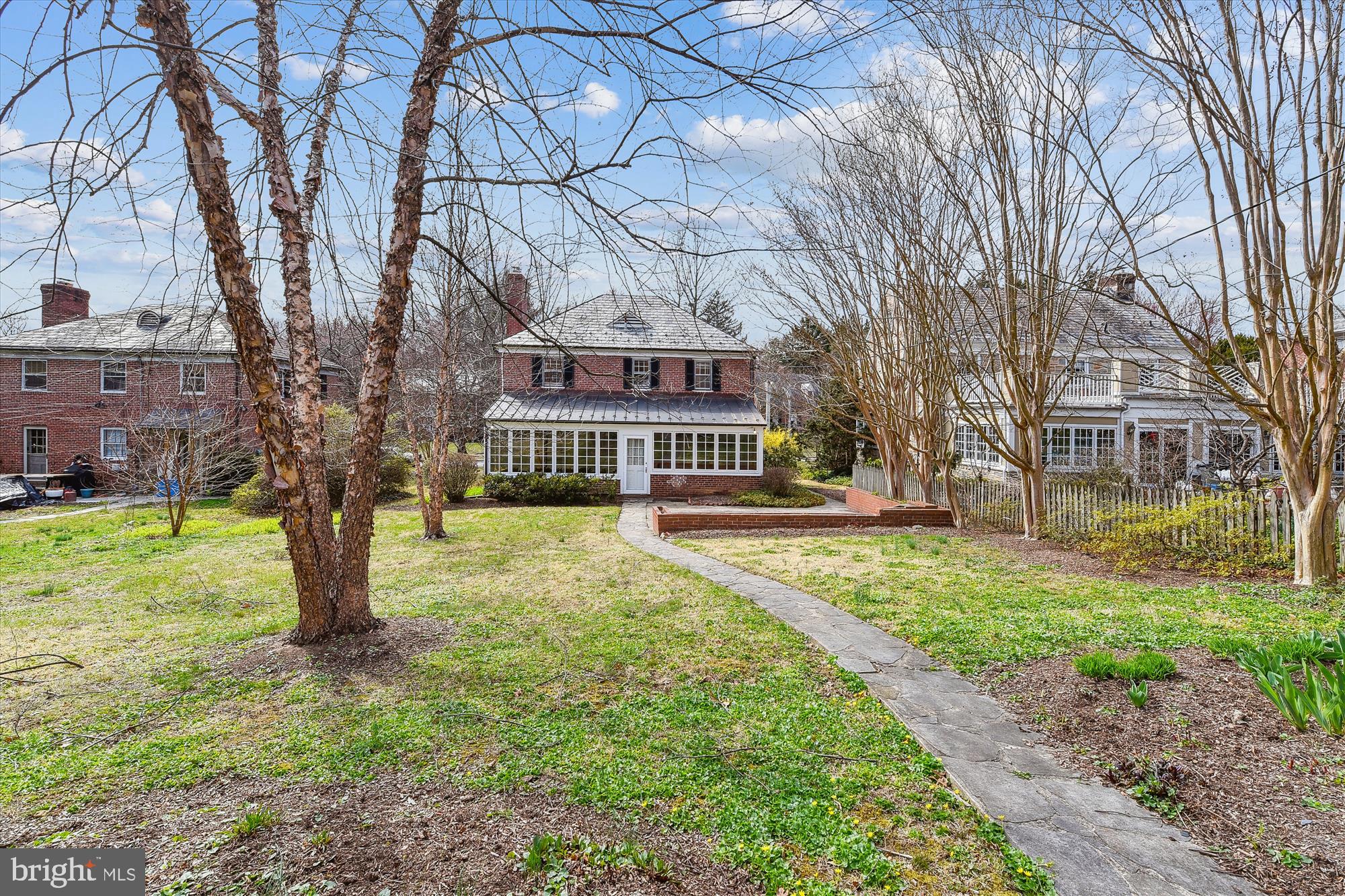 5433 Springlake Way Baltimore, MD 21212 - Photo 47 of 58 a front view of a house with a yard