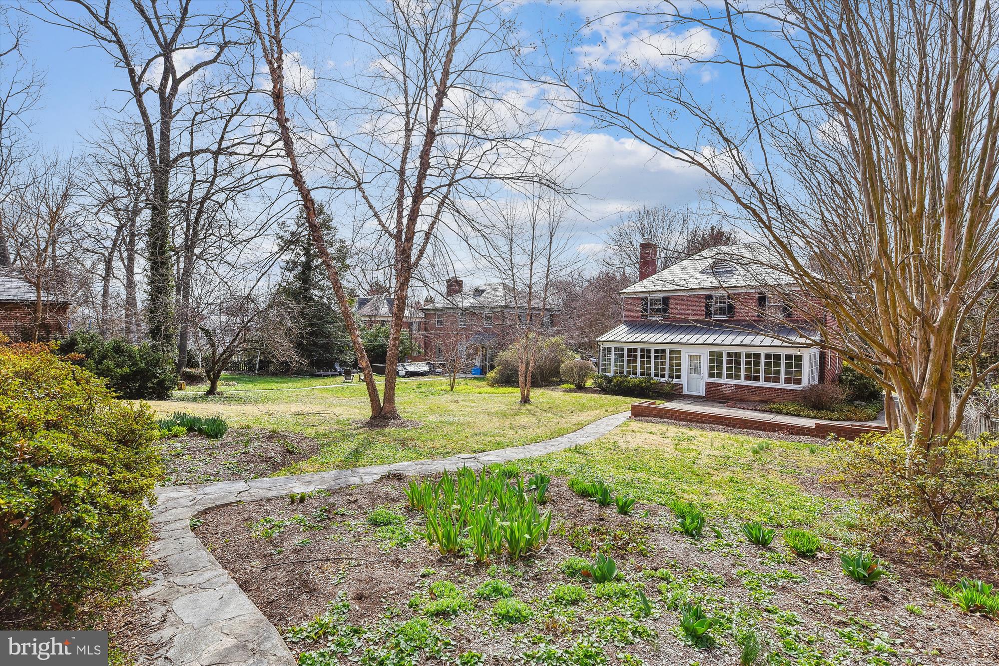 5433 Springlake Way Baltimore, MD 21212 - Photo 48 of 58 a view of an house with backyard and trees