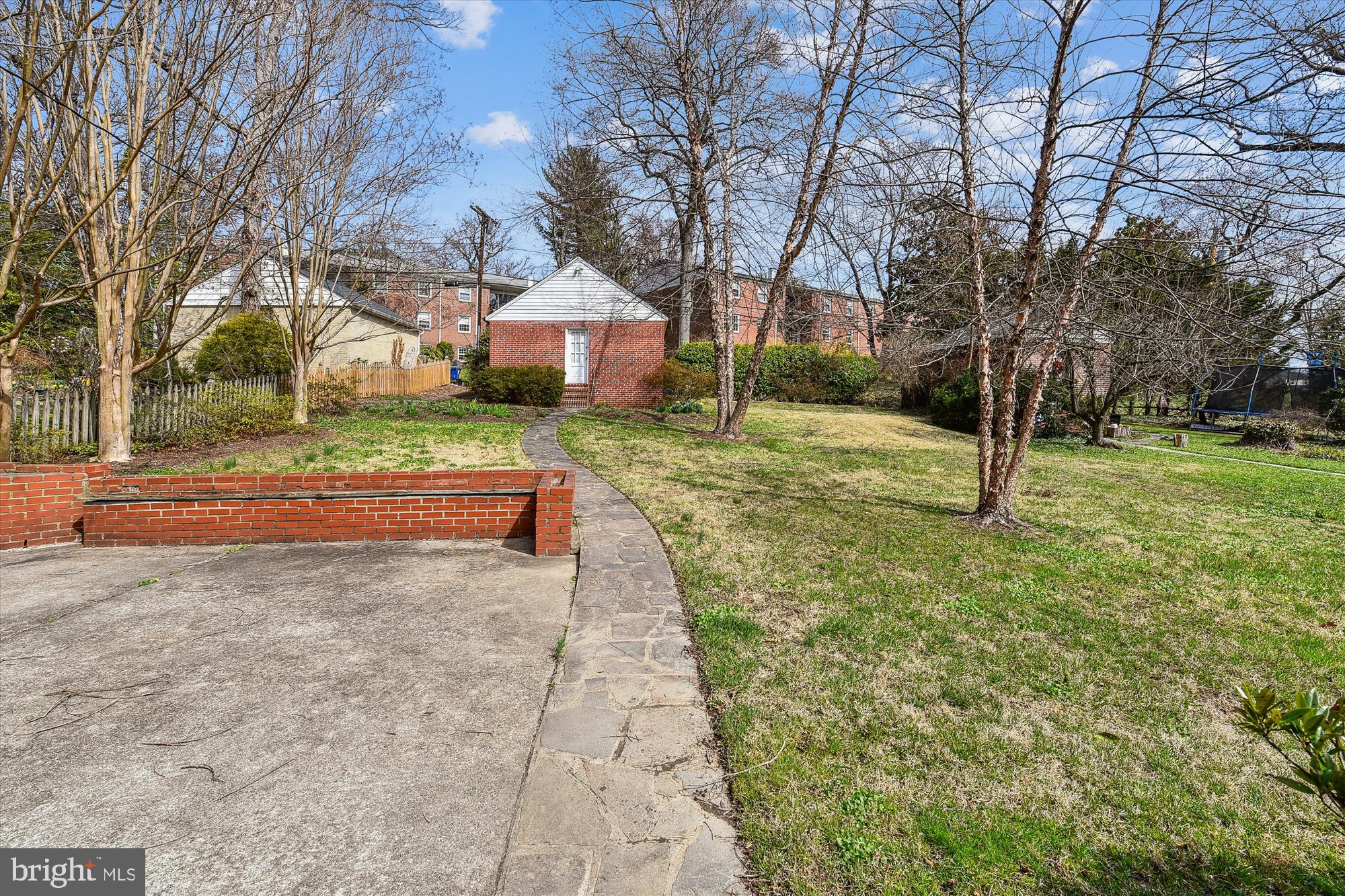 5433 Springlake Way Baltimore, MD 21212 - Photo 52 of 58 a view of a yard with plants and trees
