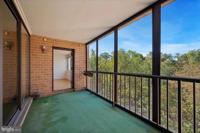 a view of a porch with a big yard