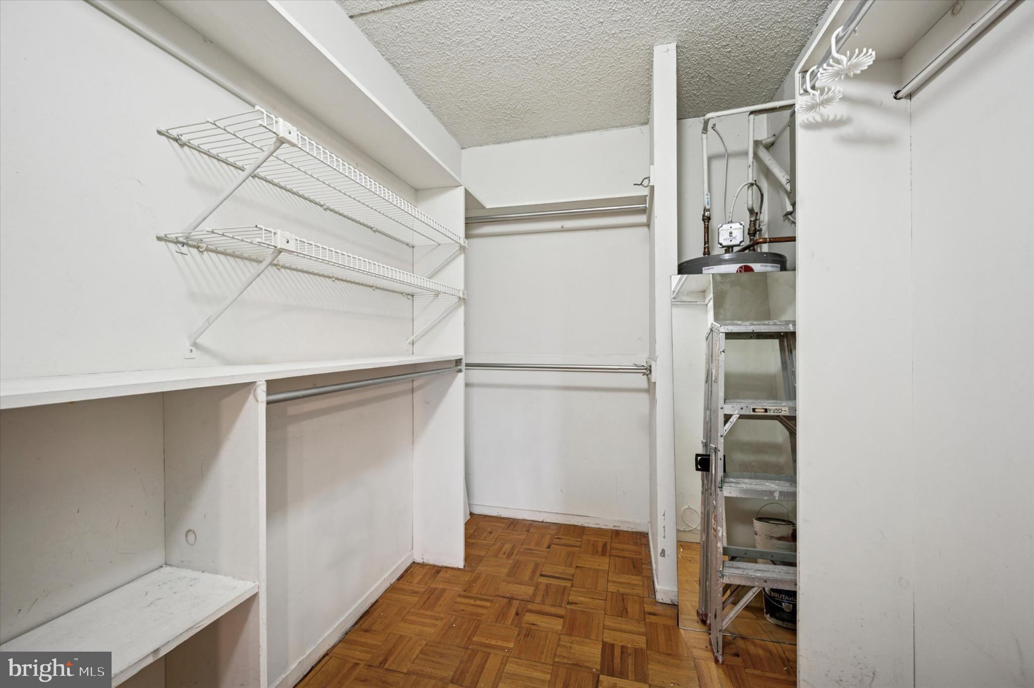 19 Rock Hill Road, Unit 7D Bala Cynwyd, PA 19004 - Photo 32 of 37 a view of walk in closet with empty racks