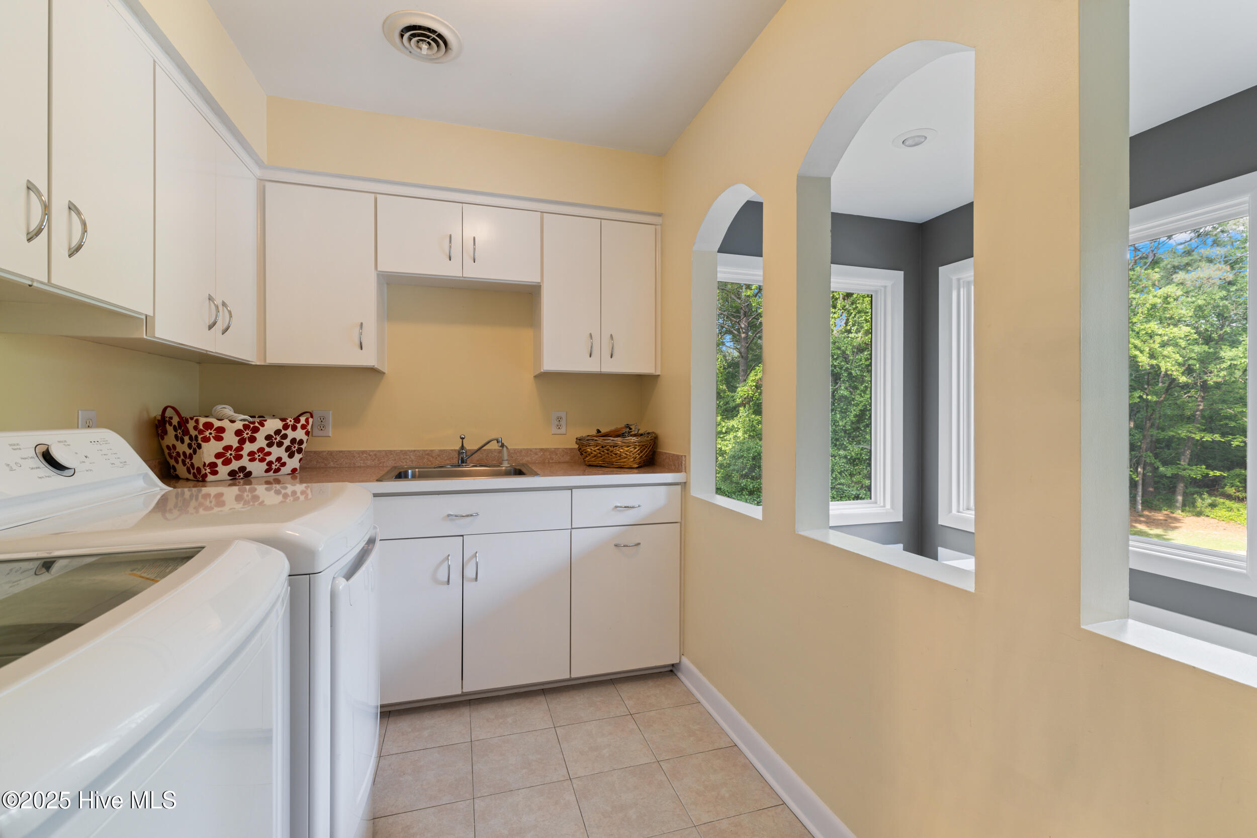 145 Meadowlark Road Goldsboro, NC 27534 - Photo 60 of 74 Laundry Room With overlook into the 4 seasons Room