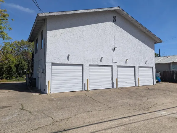 a view of a house with a garage