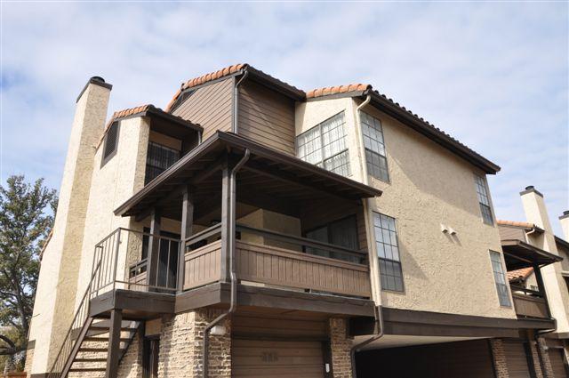 5630 Spring Valley Road, Unit 19B Dallas, TX 75254 - Photo 11 of 25 a view of a house with a door and wooden floor