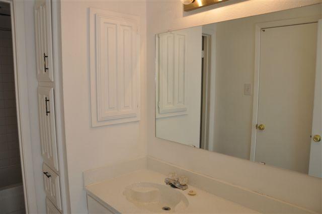 5630 Spring Valley Road, Unit 19B Dallas, TX 75254 - Photo 16 of 25 a bathroom with a bathtub and shower