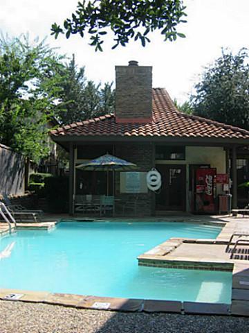 5630 Spring Valley Road, Unit 19B Dallas, TX 75254 - Photo 4 of 25 a view of a house with backyard porch and sitting area