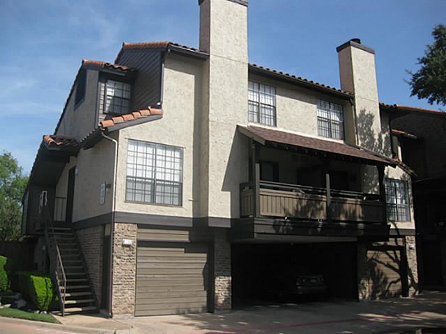 5630 Spring Valley Road, Unit 19B Dallas, TX 75254 - Photo 7 of 25 a front view of a house with barbeque
