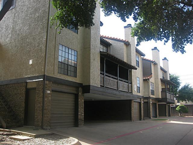 5630 Spring Valley Road, Unit 19B Dallas, TX 75254 - Photo 10 of 25 a view of a house with a tree
