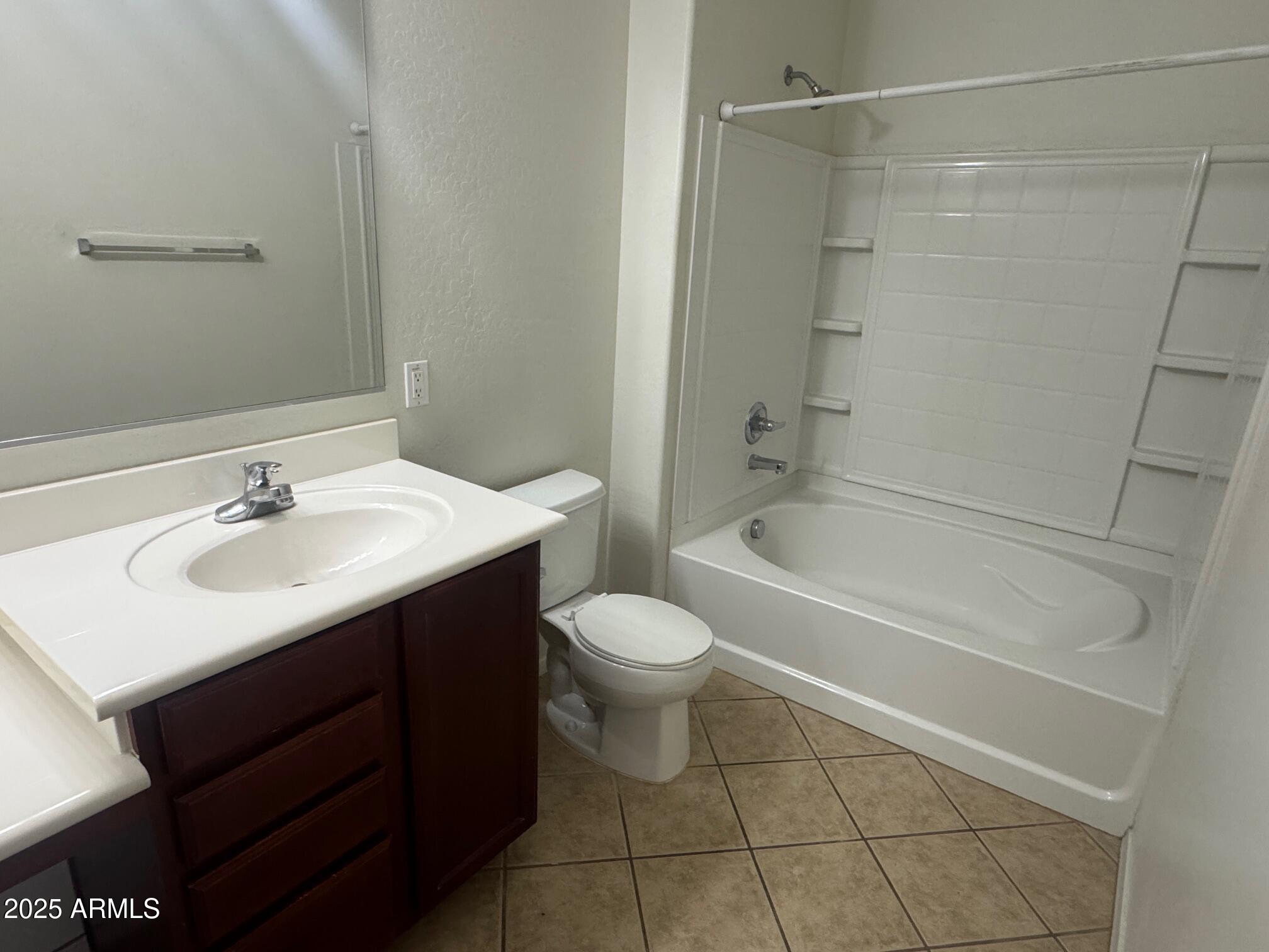 8105 West Groom Creek Road Phoenix, AZ 85043 - Photo 12 of 13 a bathroom with a sink toilet and shower