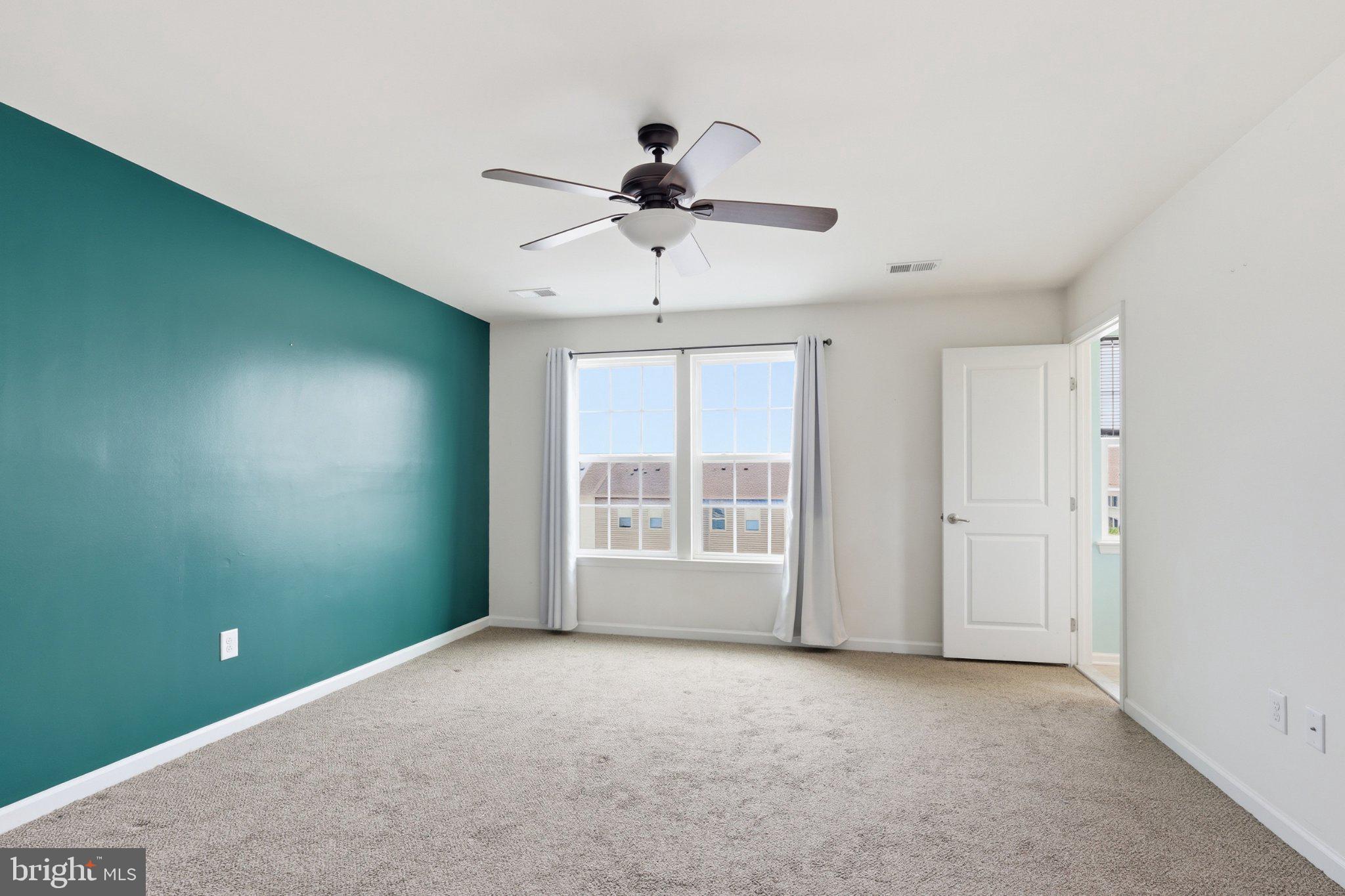 522 Ann Moore Street Dover, DE 19904 - Photo 26 of 42 Spacious room with vibrant accent wall.