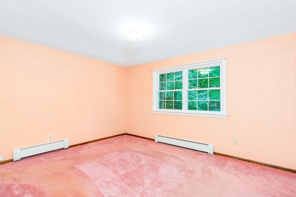 135 Blake Corner Road Phillipston, MA 01331 - Photo 15 of 42 an empty room with a window