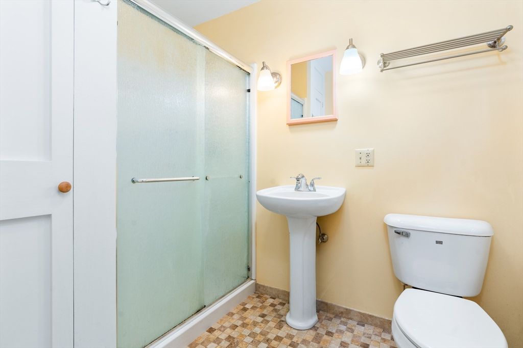 135 Blake Corner Road Phillipston, MA 01331 - Photo 18 of 42 a bathroom with a sink toilet and shower